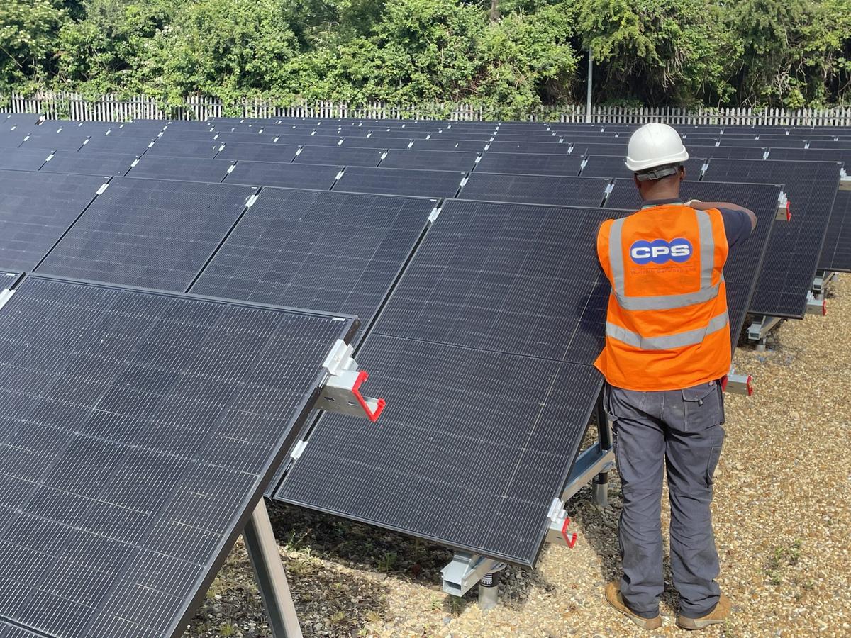 CPS engineer installing solar panels